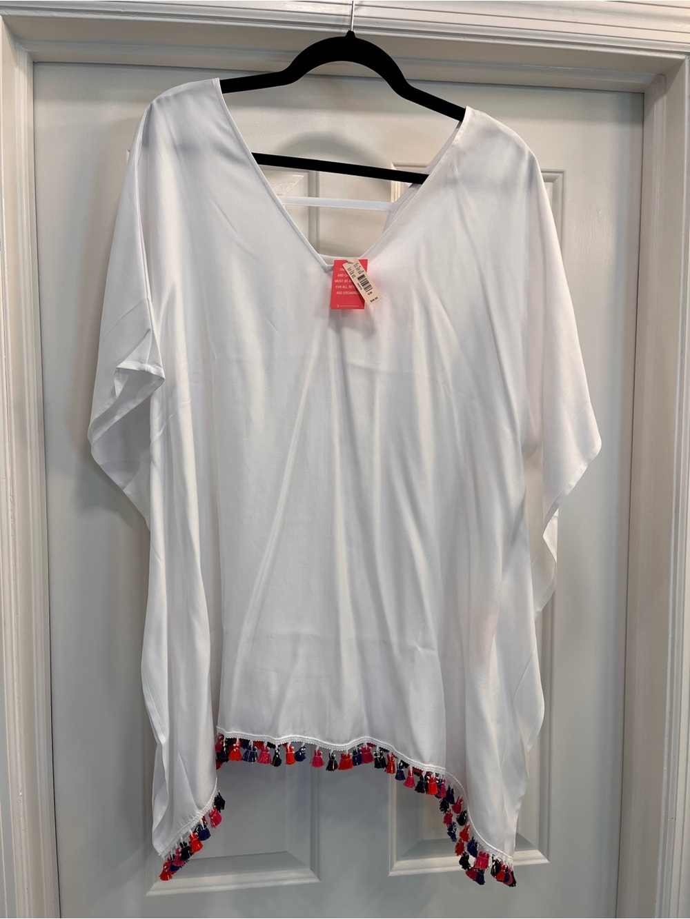Uncommon White V-Neck Tunic with Red and Navy Tassel Hem
